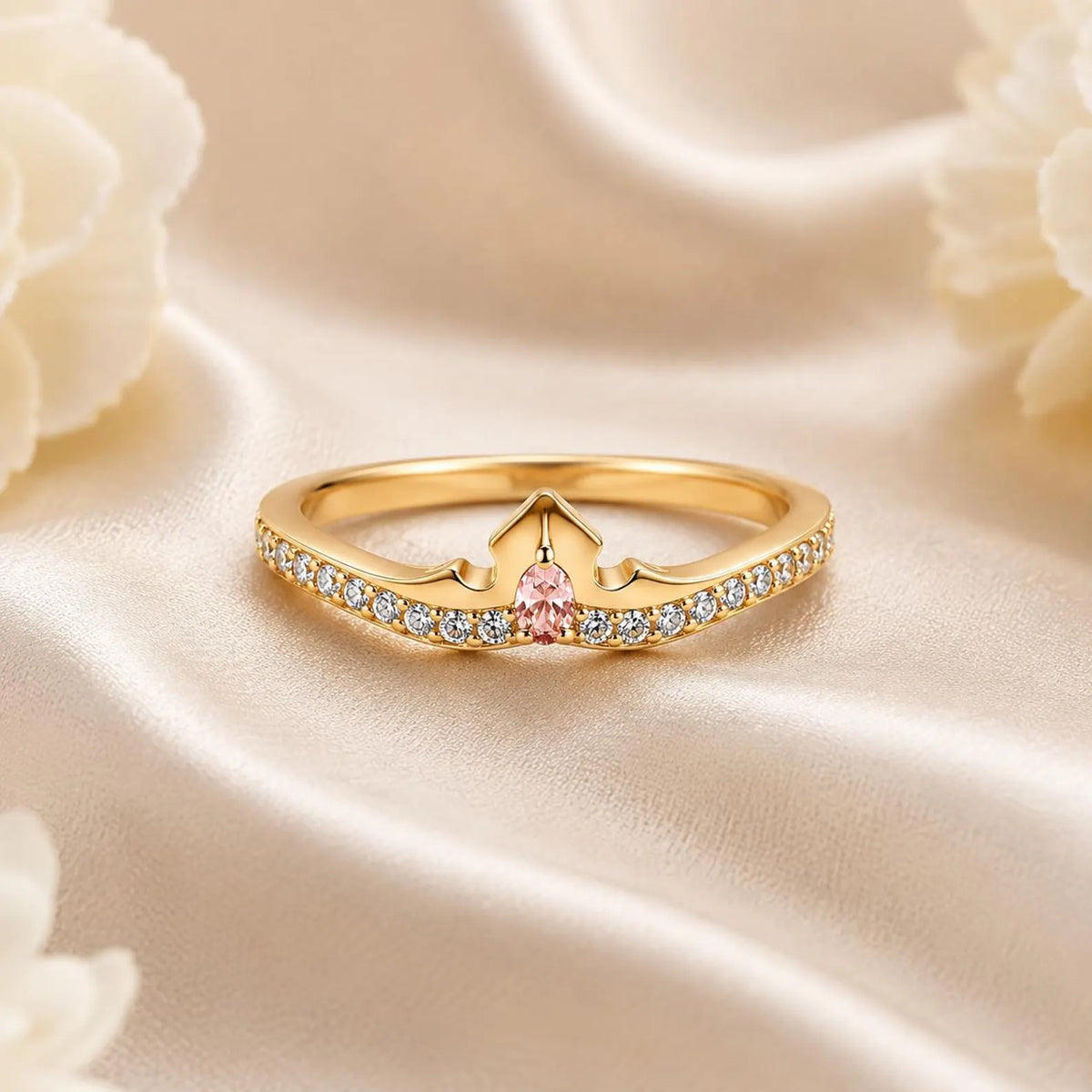 Aurora-inspired gold-plated tiara ring with a pink center stone