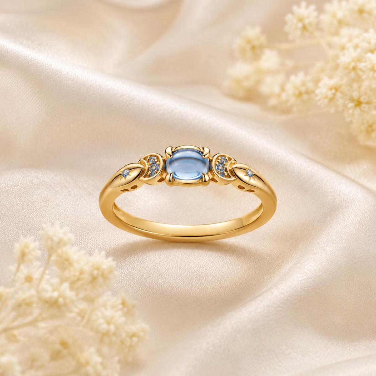 Jasmine-inspired ring with a blue center stone, crescent moons and stars (view 2)
