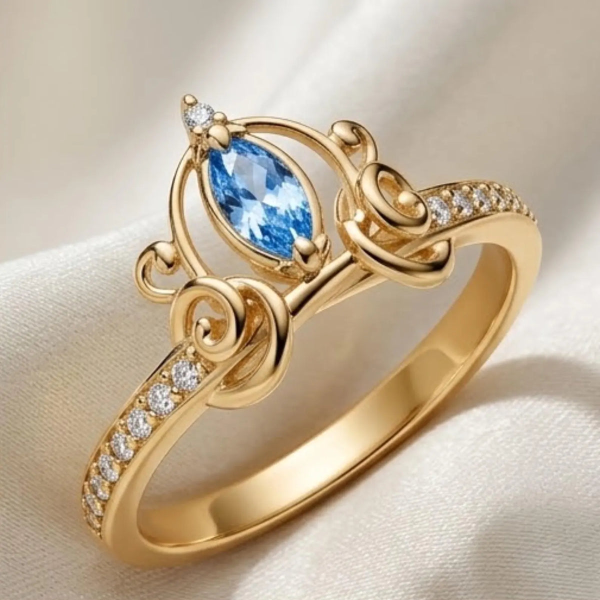 Gold-plated Cinderella carriage ring with a blue center stone (view 2)