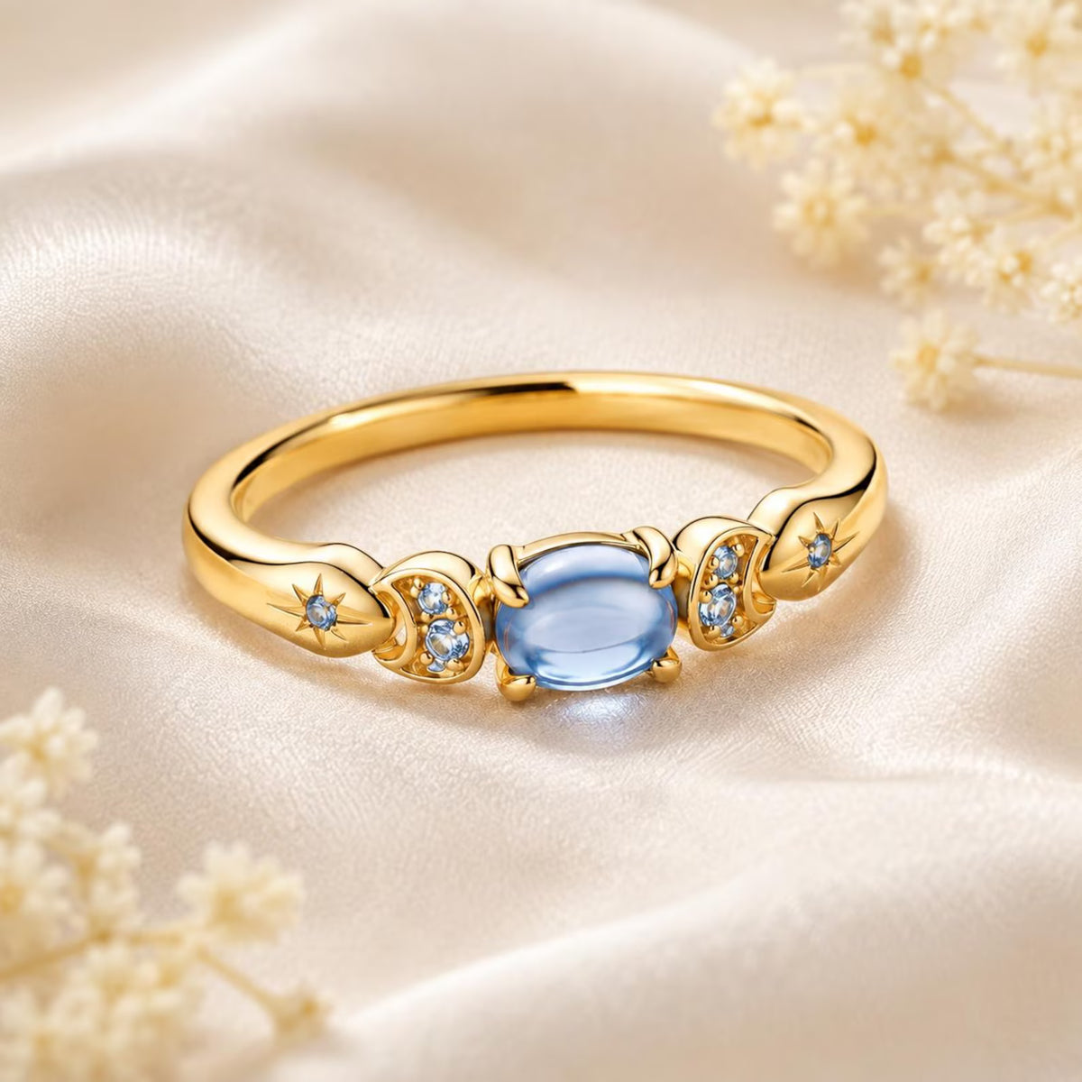 Jasmine-inspired ring with a blue center stone, crescent moons and stars (view 3)