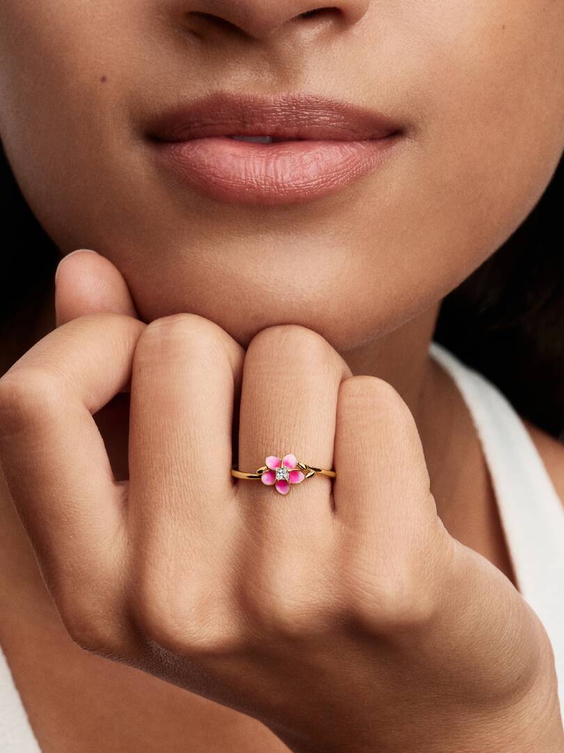 Moana-inspired gold-plated flower ring with pink enamel petals (view 3)