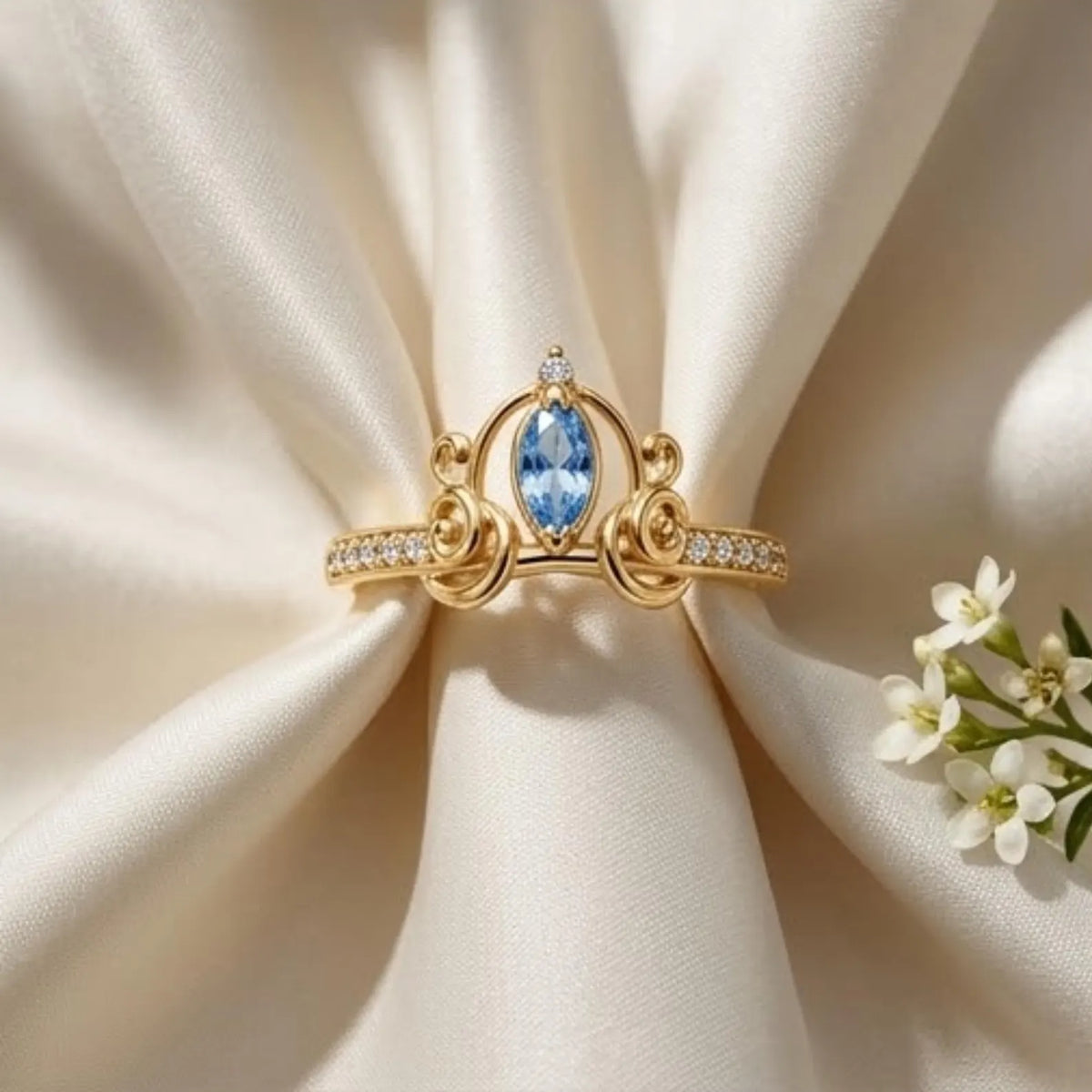 Gold-plated Cinderella carriage ring with a blue center stone (view 3)